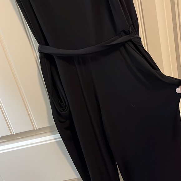 One piece straight leg jumpsuit can be dressed up or down. - Picture 2 of 3